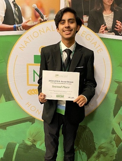 Cody Garcia with award